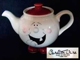 Fake face teapot with feet